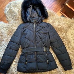 Bebe Women’s belted hooded faux fur puffer jacket - black Small